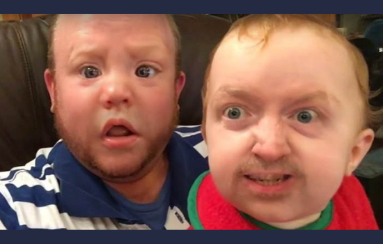 Imagem de pai e filho com rostos invertidos por app de montagem